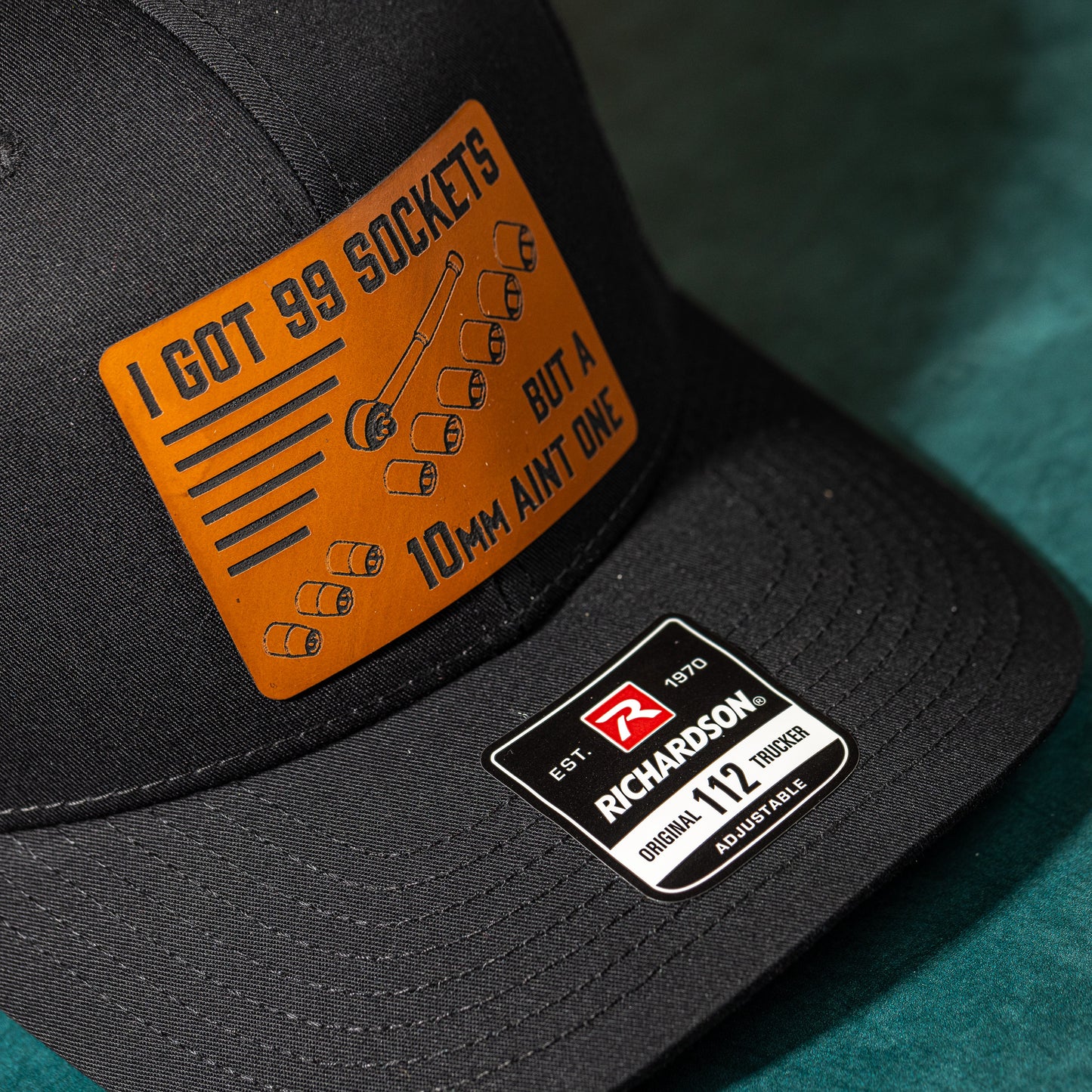 99 Sockets Trucker Hat